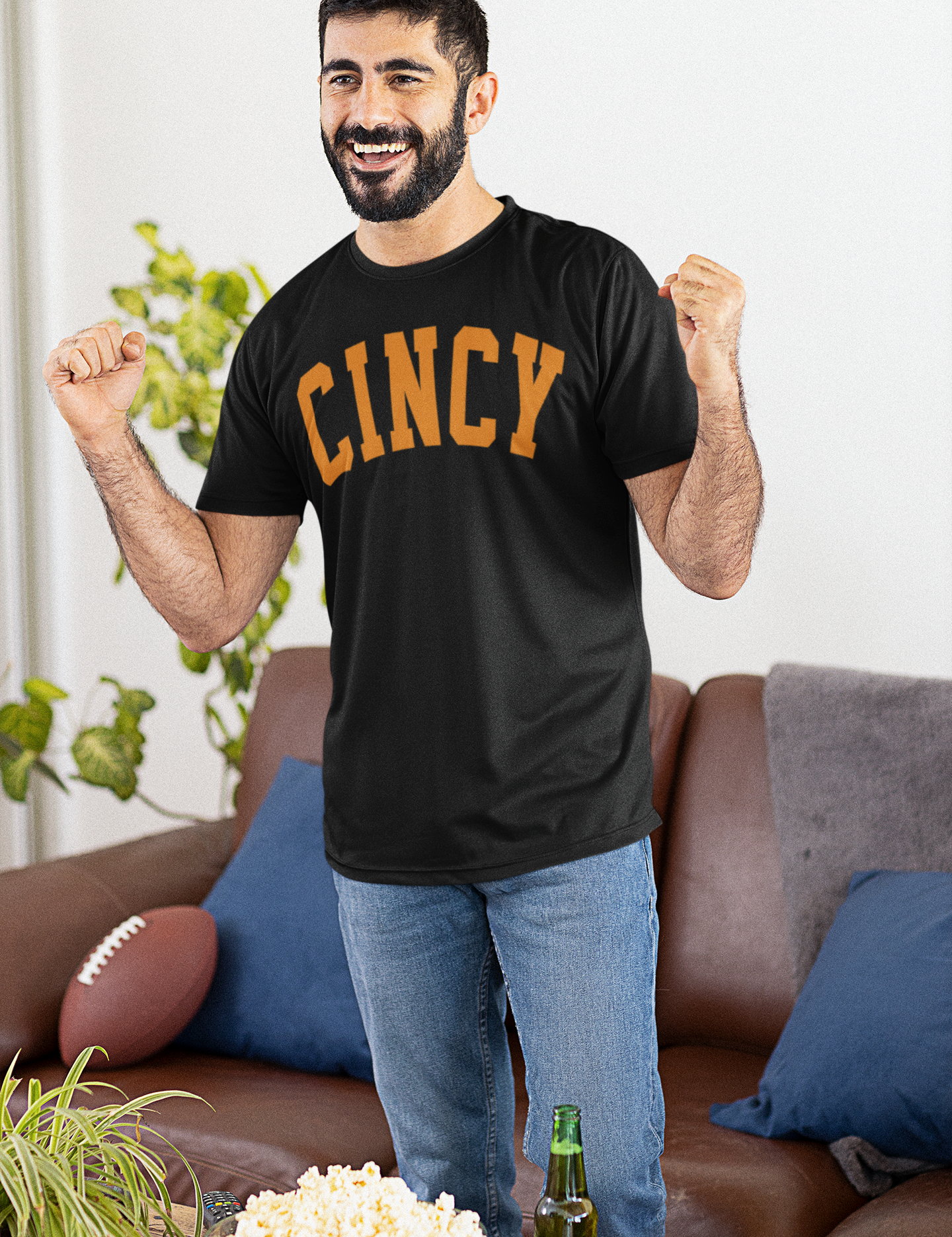 jersey-mockup-of-a-football-fan-having-popcorn-while-watching-the-big-game-at-home-m20412.png