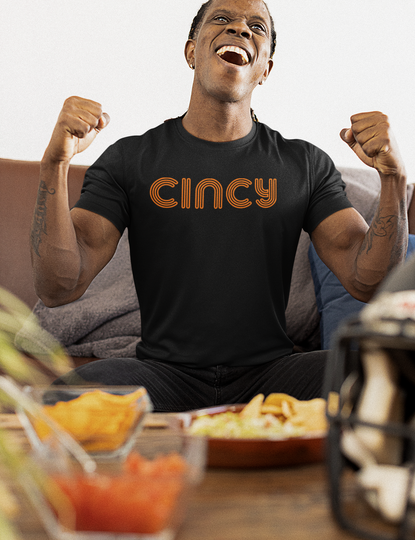 sublimated-jersey-mockup-featuring-a-man-watching-the-big-game-at-home-m20402.png