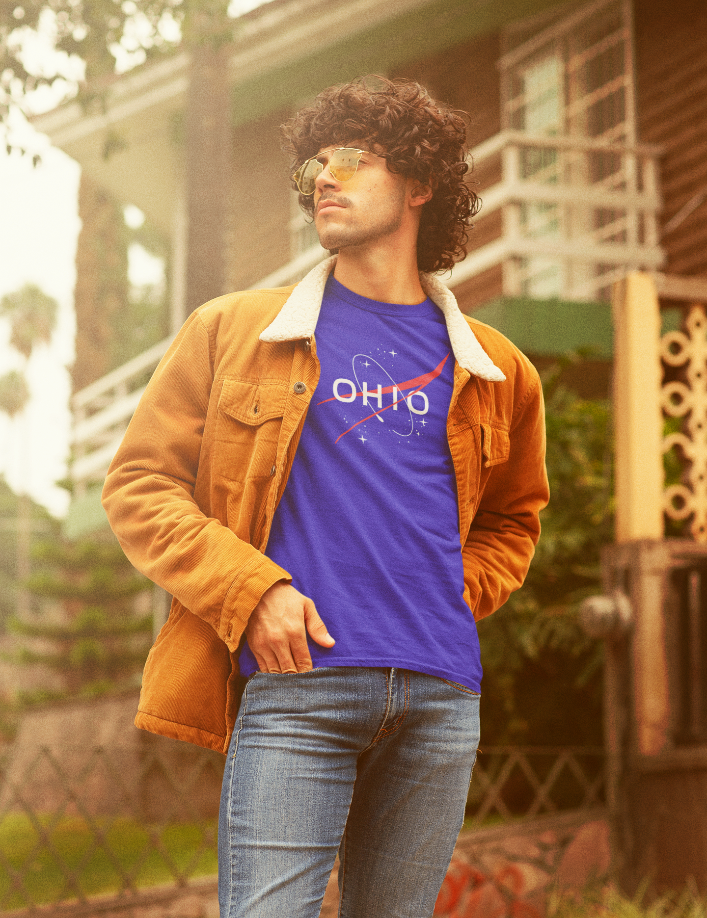 t-shirt-mockup-featuring-a-curly-haired-man-with-a-retro-style-m10119.png