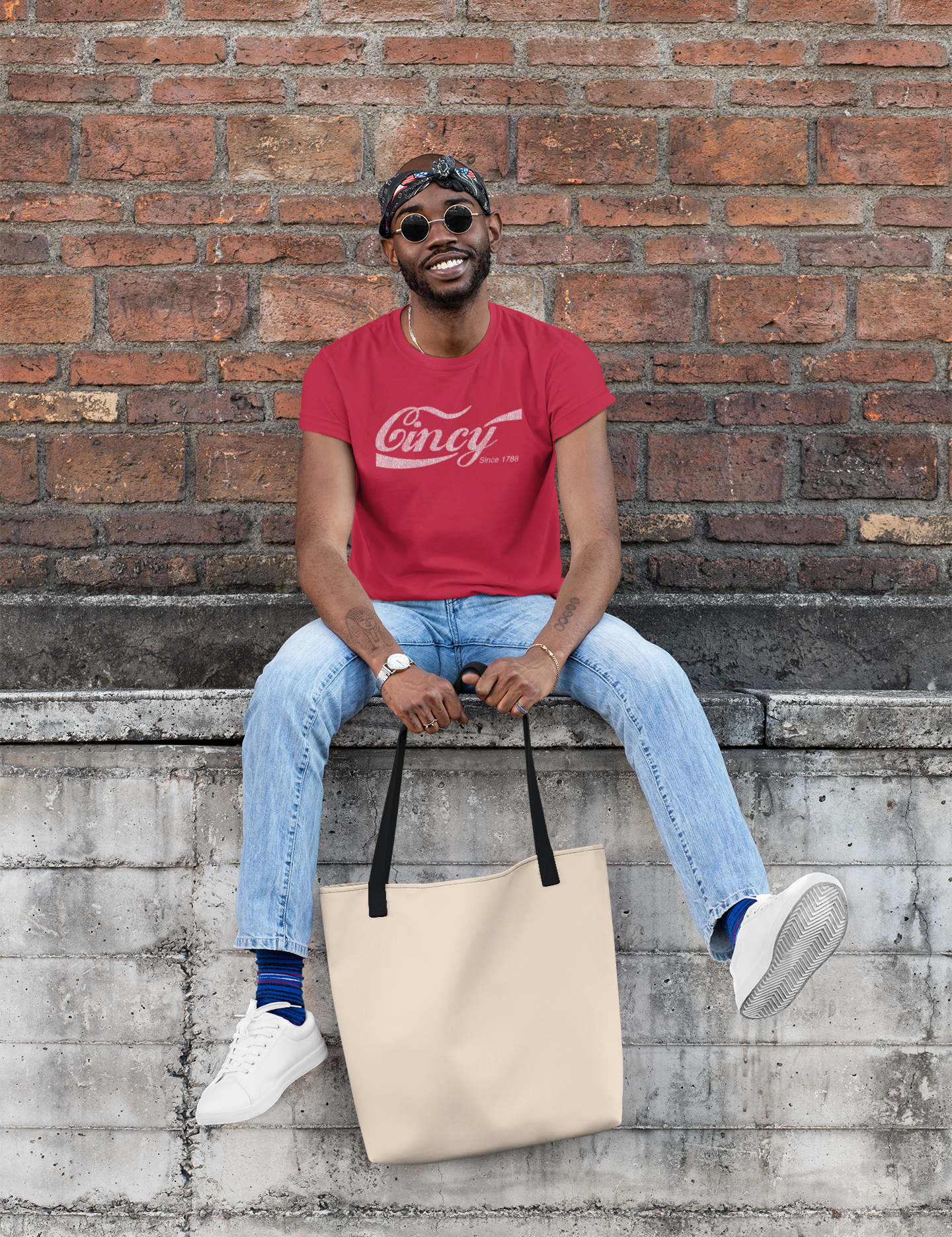 t-shirt-mockup-of-a-man-with-a-tote-bag-in-front-of-an-old-brick-wall-29437.png